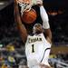 Michigan freshman Glenn Robinson III dunks the ball in the second half at Crisler Center on Sunday, Jan. 6. Michigan beat Iowa 95-67 in the Big Ten home opener. Melanie Maxwell I AnnArbor.com